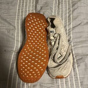 Worn No bull sneakers.  The color is a creamy color.